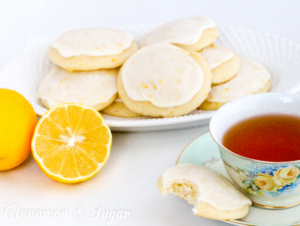Lemon Ricotta Cookies are super moist lemony, cake-like cookies, thanks to the ricotta cheese while the icing brings an extra bite of tart & sweet flavors. Recipe shared from Debra Sennefelder, author of THE HIDDEN CORPSE.