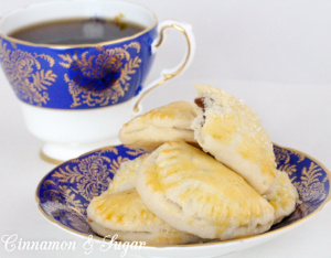 Lucy's Date-Stuffed Cookies have a sweet, cinnamon-y filling that is encased in flaky cookie dough -- like a mini turnover! Recipe shared with permission granted by Tina Kashian, author of ONE FETA IN THE GRAVE.