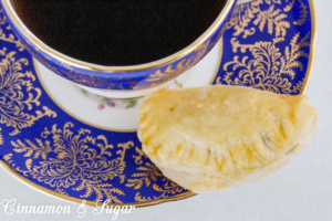 Lucy's Date-Stuffed Cookies have a sweet, cinnamon-y filling that is encased in flaky cookie dough -- like a mini turnover! Recipe shared with permission granted by Tina Kashian, author of ONE FETA IN THE GRAVE.