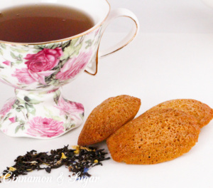 Paleo Earl Grey Madeleines are gluten- & dairy-free cake-like cookies. A subtle hint of Earl Gray tea make these perfect for tea-time or a champagne brunch! Recipe shared from cozy mystery, RESTAURANT WEEKS ARE MURDER by Libby Klein. 