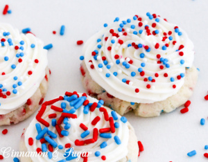 Sprinkled with Fun Cookies start with a base of cake mix, resulting in cake-like treats that take mere minutes to scoop onto a baking sheet and begin baking. Recipe shared with permission granted by Catherine Bruns, author of SPRINKLED IN MALICE.