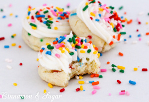 Sprinkled with Fun Cookies start with a base of cake mix, resulting in cake-like treats that take mere minutes to scoop onto a baking sheet and begin baking. Recipe shared with permission granted by Catherine Bruns, author of SPRINKLED IN MALICE.