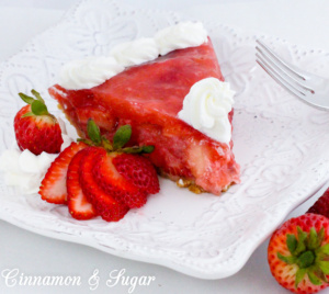 Beautiful jewel-toned Piled High Strawberry Pie combines both fresh and cooked strawberries while sweetened whipped cream provides the crowning touch. Recipe shared with permission granted by Krista Davis, author of THE DIVA SWEETENS THE PIE.