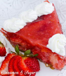 Beautiful jewel-toned Piled High Strawberry Pie combines both fresh and cooked strawberries while sweetened whipped cream provides the crowning touch. Recipe shared with permission granted by Krista Davis, author of THE DIVA SWEETENS THE PIE.