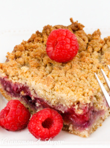 Berry Crumb Bars start with an easy to make dough that serves as both the crust and crumb topping, while a generous amount of juicy berries provide a jammy filling. Recipe shared from cozy mystery SOUTHERN SASS AND KILLER CRAVINGS by Kate Young.