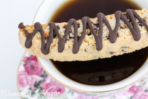 Chocolate Peanut Butter Biscotti is a twice baked cookie that is made to dip in your favorite beverage. Dredged in chocolate makes this Italian cookie impossible to resist. Recipe shared from A SECRET IN THYME by Maureen Klovers.