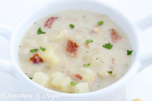 New England Clam Chowder is rich without relying on heavy cream and full of the briny flavor of clams and smoky bacon, but isn’t difficult or time consuming to make. Recipe from DRAWN AND BUTTERED by Shari Randall.