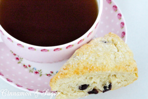 The slightly tart, slightly sweet addition of dried cranberries adds both flavor and texture to these delectable, tender Cranberry Scones.  Recipe shared with permission granted by Lynn Cahoon, author of SCONED TO DEATH.