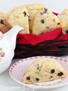 The slightly tart, slightly sweet addition of dried cranberries adds both flavor and texture to these delectable, tender Cranberry Scones.  Recipe shared with permission granted by Lynn Cahoon, author of SCONED TO DEATH.