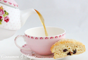 The slightly tart, slightly sweet addition of dried cranberries adds both flavor and texture to these delectable, tender Cranberry Scones.  Recipe shared with permission granted by Lynn Cahoon, author of SCONED TO DEATH.