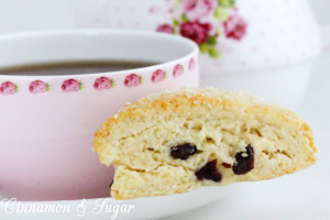 The slightly tart, slightly sweet addition of dried cranberries adds both flavor and texture to these delectable, tender Cranberry Scones.  Recipe shared with permission granted by Lynn Cahoon, author of SCONED TO DEATH.