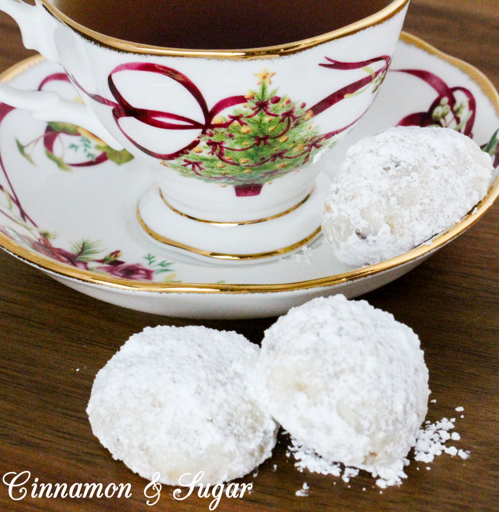 Cranberry Walnut Cookie Balls combine the crunch of walnuts in a shortbread-style cookie along with the tart sweetness of cranberries. Rolled in fluffy powdered sugar, these are a welcome addition to any holiday cookie platter. Recipe shared with permission granted by Meg Macy, author of HAVE YOURSELF A BEARY LITTLE MURDER. 