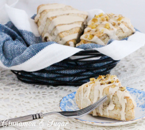 Maple Walnut Scones are ultra-rich and flaky while walnuts and maple glaze adds extra layers of flavors and textures making these a family favorite. Recipe from Karen MacInerney, author of SCONE COLD DEAD.