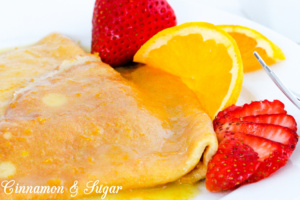 Crêpes Suzette are a few staple ingredients whisked together and paired with a few simple ingredients simmered together, creating a scrumptious treat Recipe shared with permission granted by Maya Corrigan, author of CRYPT SUZETTE.