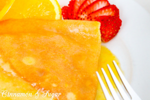 Crêpes Suzette are a few staple ingredients whisked together and paired with a few simple ingredients simmered together, creating a scrumptious treat Recipe shared with permission granted by Maya Corrigan, author of CRYPT SUZETTE.