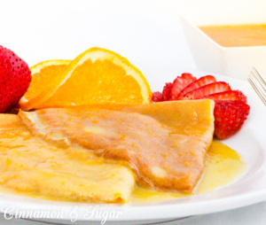 Crêpes Suzette are a few staple ingredients whisked together and paired with a few simple ingredients simmered together, creating a scrumptious treat Recipe shared with permission granted by Maya Corrigan, author of CRYPT SUZETTE.