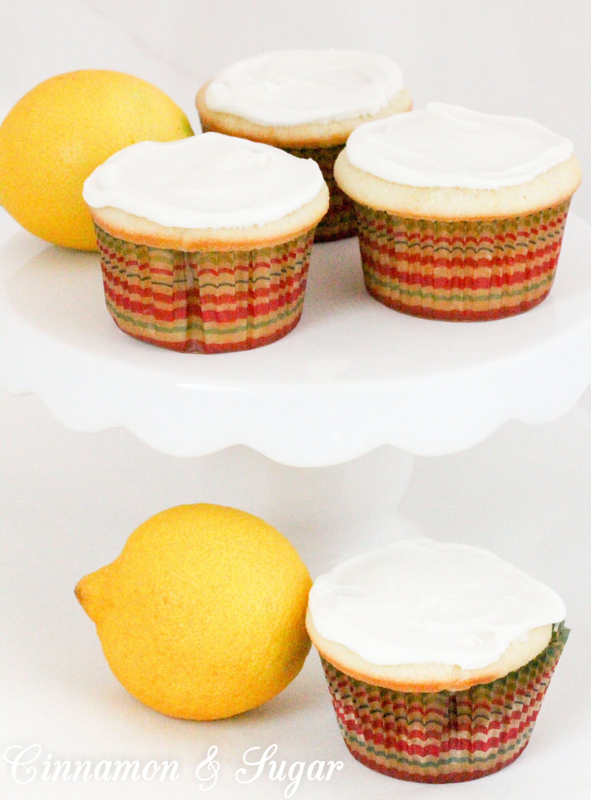 Lemony cream cheese frosting tops little lemon cakes that are super moist thanks to a generous dollop of sour cream. Perfect for afternoon tea or brunch! Recipe shared with permission granted by Maureen Klovers, author of MURDER IN THE MOONSHINE. 