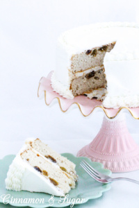 Rum Raisin Cake with Rum Buttercream starts with a cake mix, including lots of rum and is a deliciously light cake that will impress dessert lovers! Recipe shared with permission granted by Ellen Byron, author of FATAL CAJUN FESTIVAL. 