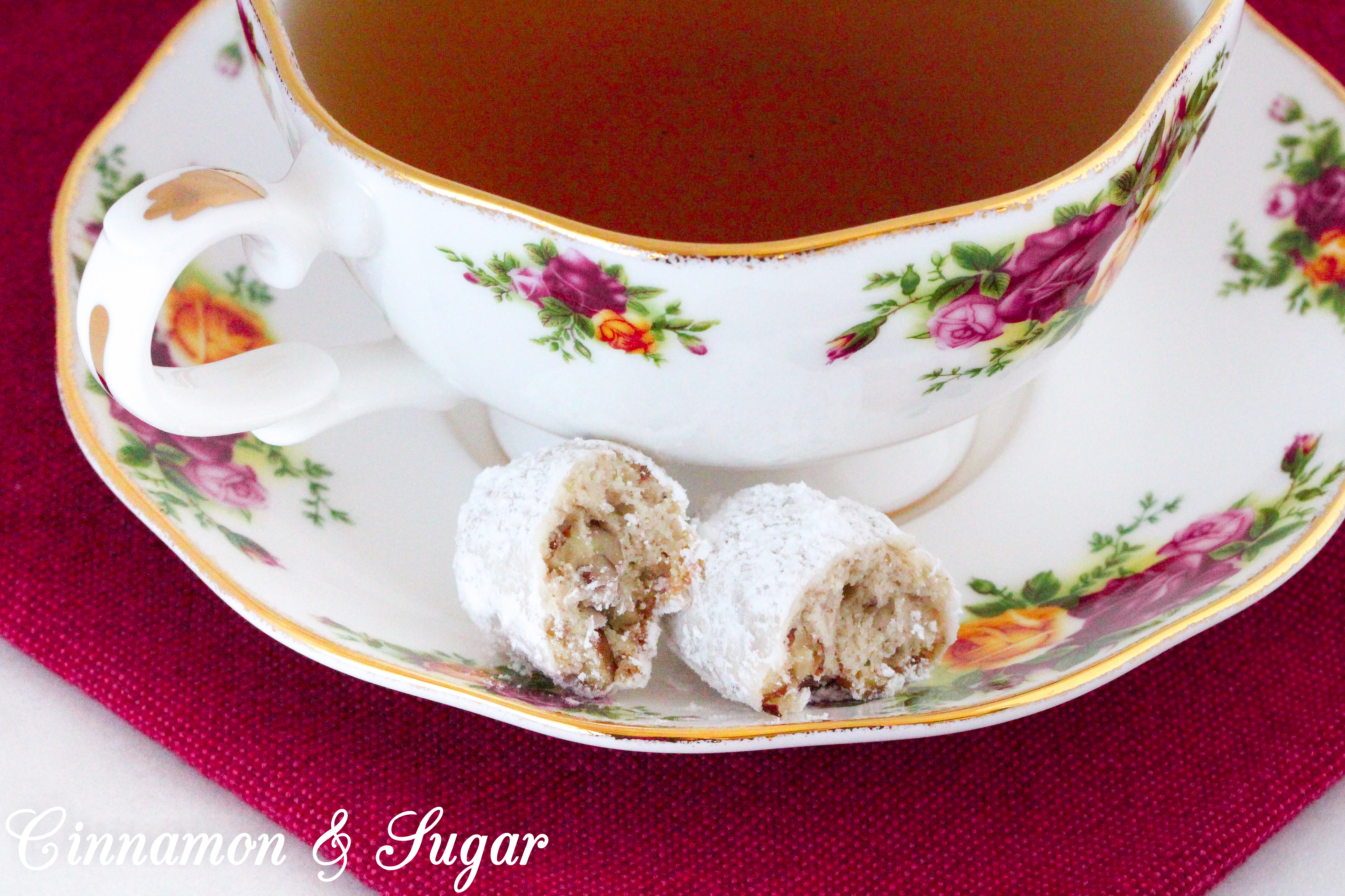 Loads of buttery pecans are mixed with a shortbread-style cookie dough, rolled into an oblong shape, and after baking, rolled in sweet powdered sugar to create the delicious cookie Pecan Jazz Tarts. Recipe shared with permission granted by Laura Childs & Terrie Farley Moran, author of MUMBO GUMBO MURDER.