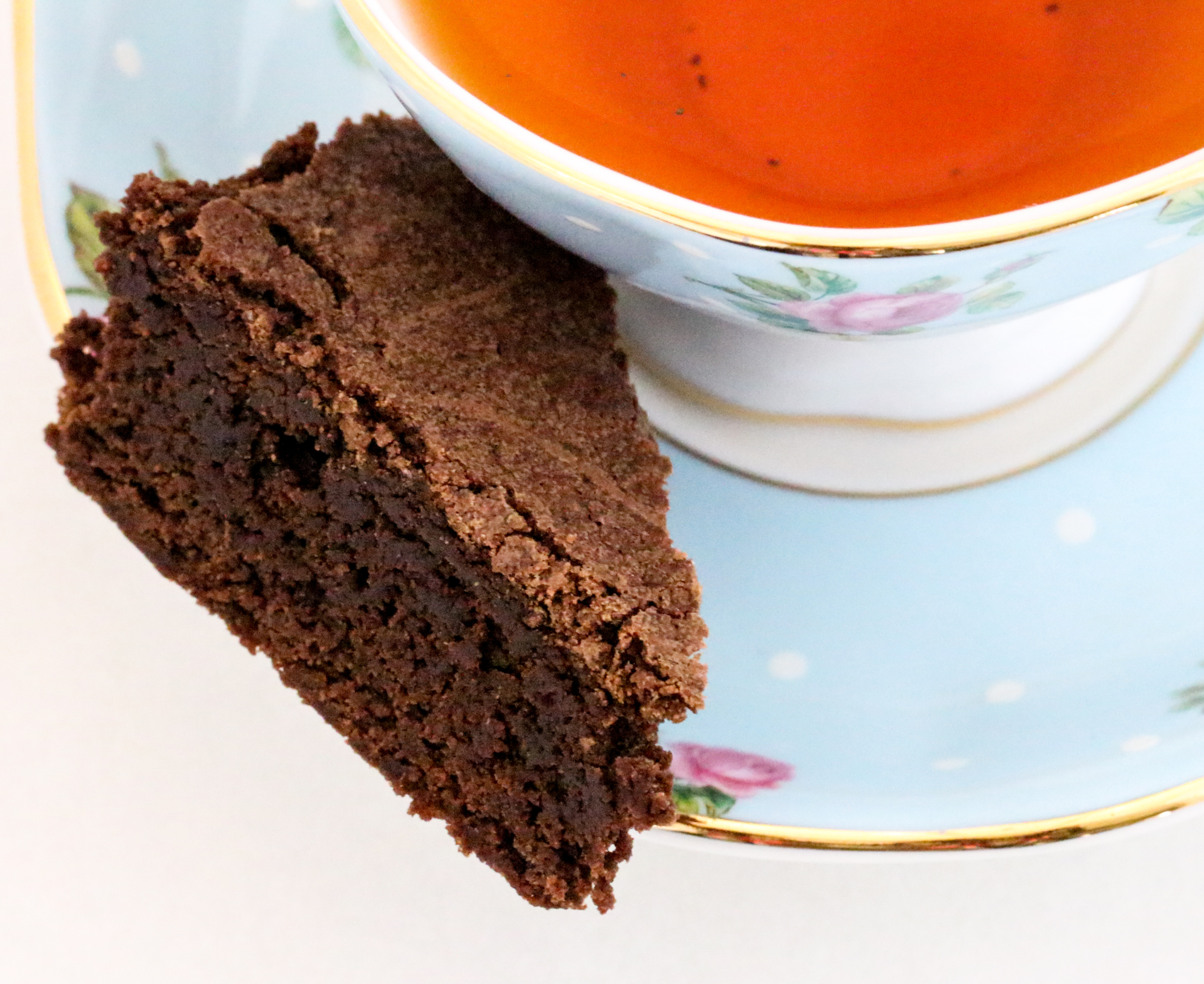 Rich and thick, almost like fudge, Olga's Brownies are scrumptious treats that will satisfy the most avid chocoholic! And cleanup is a breeze since the recipe uses only 1 saucepan to whisk the ingredients together. Recipe shared with permission granted by Barbara Ross, author of SEALED OFF. 