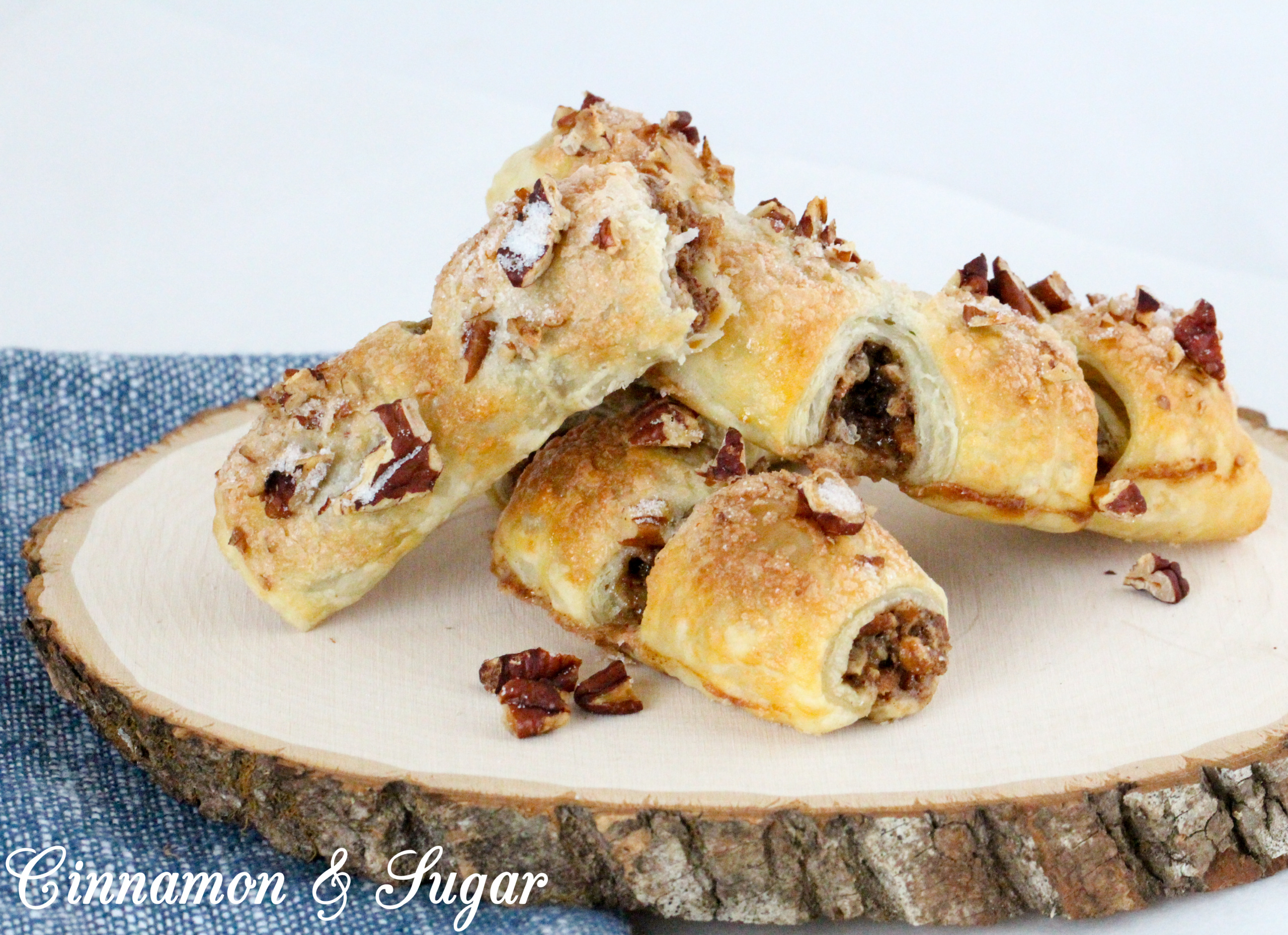 With crunchy, buttery pecans, an ample amount of cinnamon, and pre-made puff pastry, these Bear Claws are a tasty and easy addition to any breakfast, brunch, or coffee break! Recipe shared with permission granted by Maddie Day, author of MURDER AT THE TAFFY SHOP. 