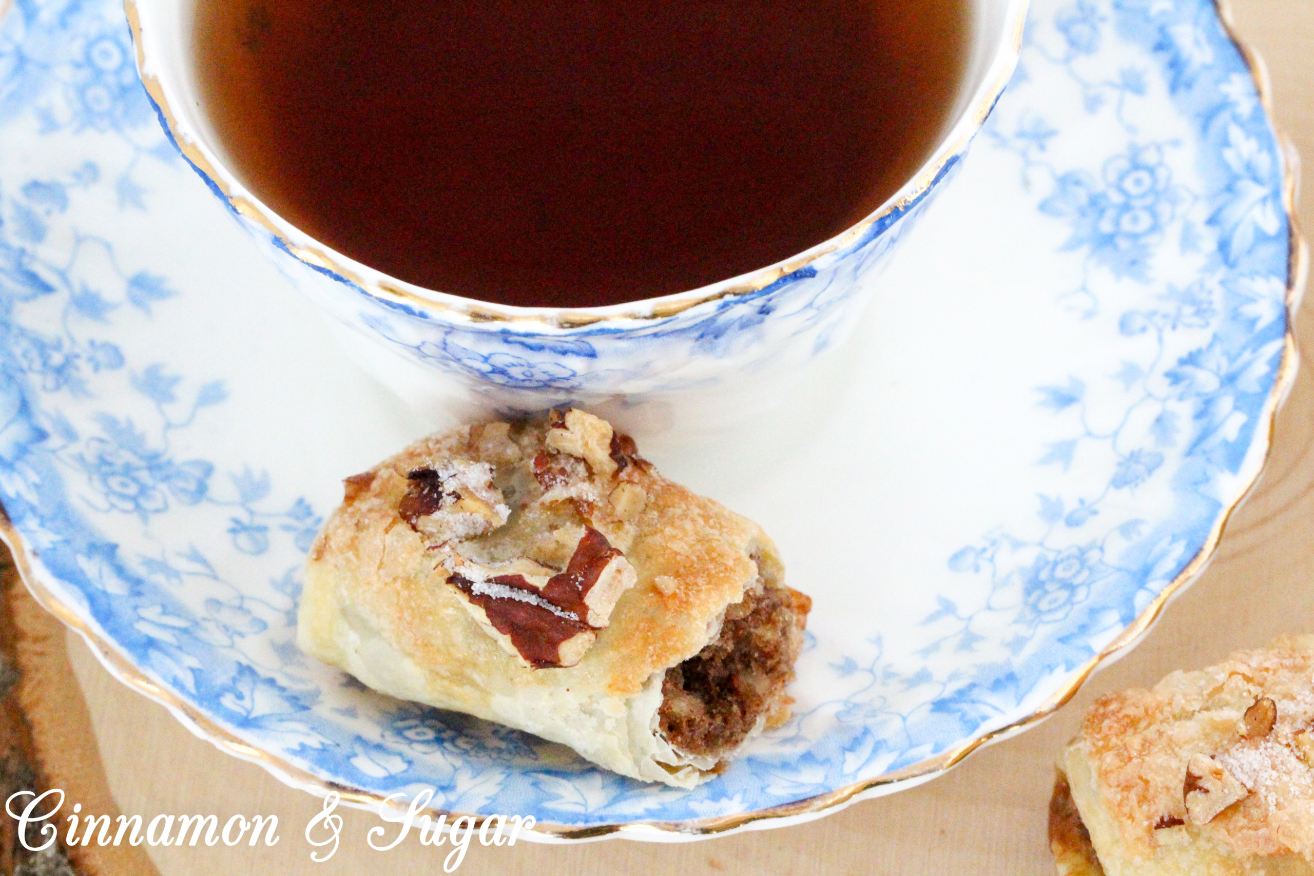 With crunchy, buttery pecans, an ample amount of cinnamon, and pre-made puff pastry, these Bear Claws are a tasty and easy addition to any breakfast, brunch, or coffee break! Recipe shared with permission granted by Maddie Day, author of MURDER AT THE TAFFY SHOP. 