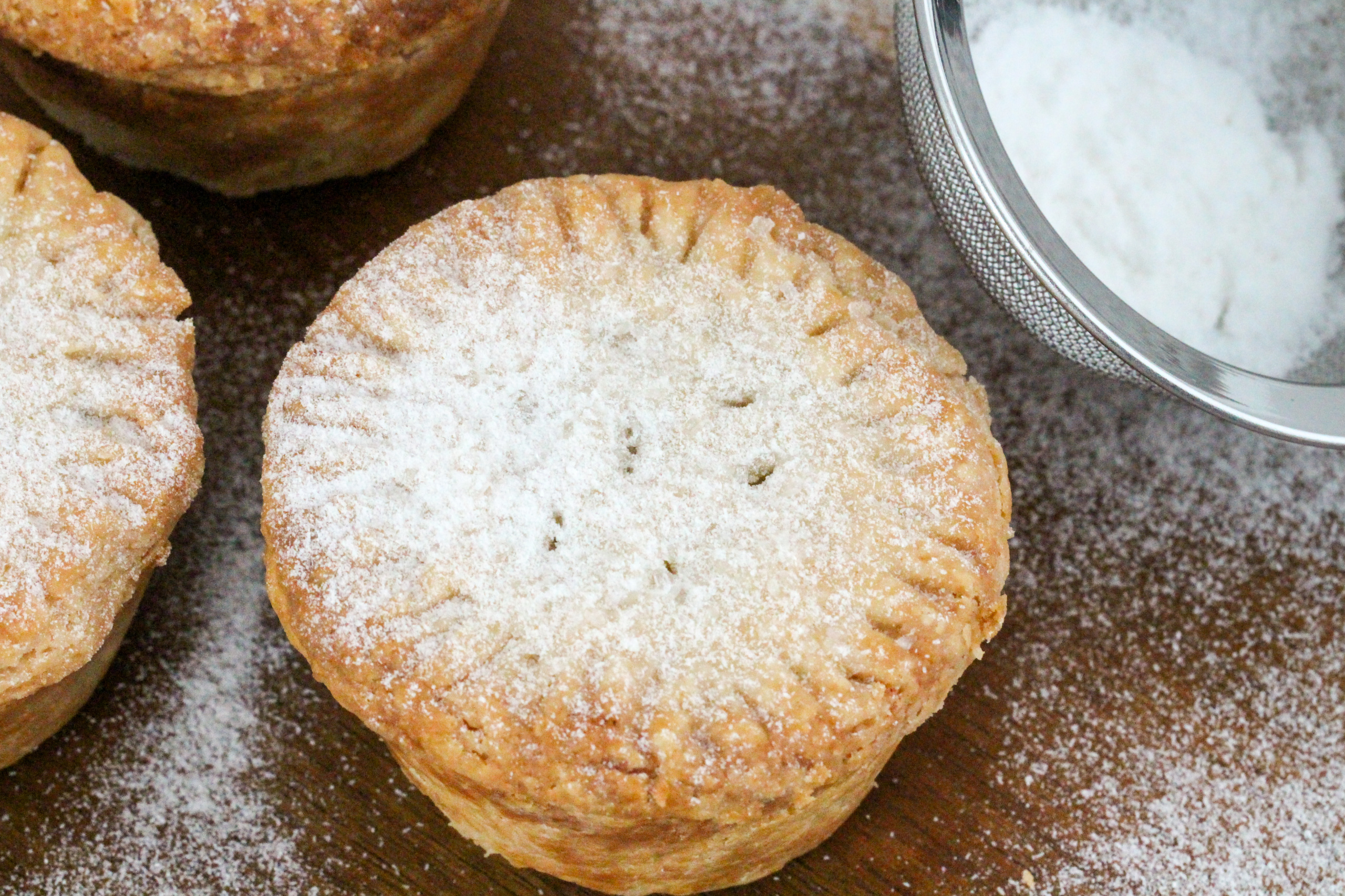 A mixture of dried fruits, sugar, spices, and brandy, Christmas Mince Pie is a traditional British holiday dessert. Recipe shared with permission granted by H.Y. Hanna, author of THE MOUSSE WONDERFUL TIME OF THE YEAR. 