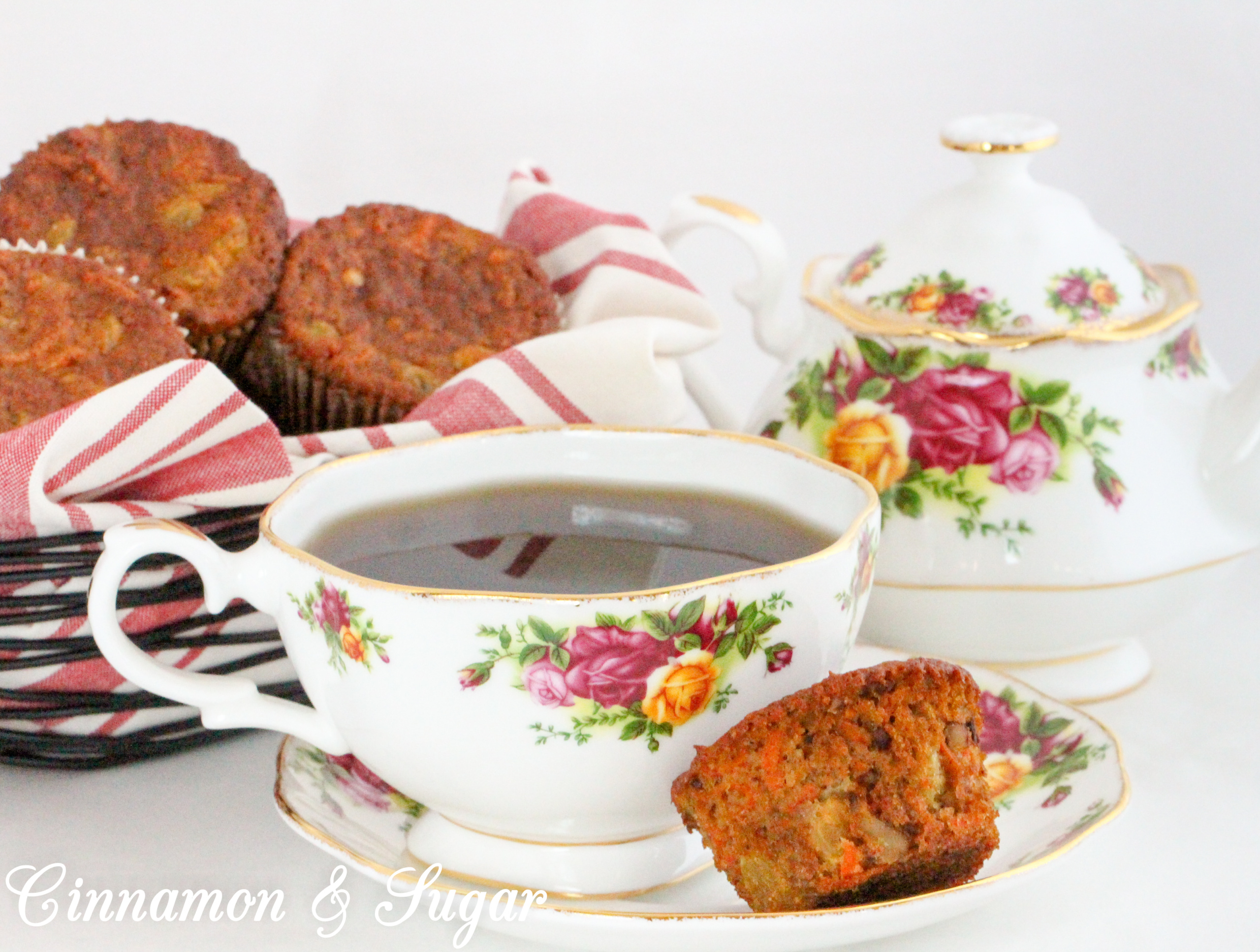 Paleo Carrot Cake Muffins with Rum Raisins are chock-full of flavor and moistness thanks to rum-infused golden raisins, a generous portion of carrots, with warming spices and honey. Recipe shared with permission granted by Libby Klein, author of THEATER NIGHTS ARE MURDER. 