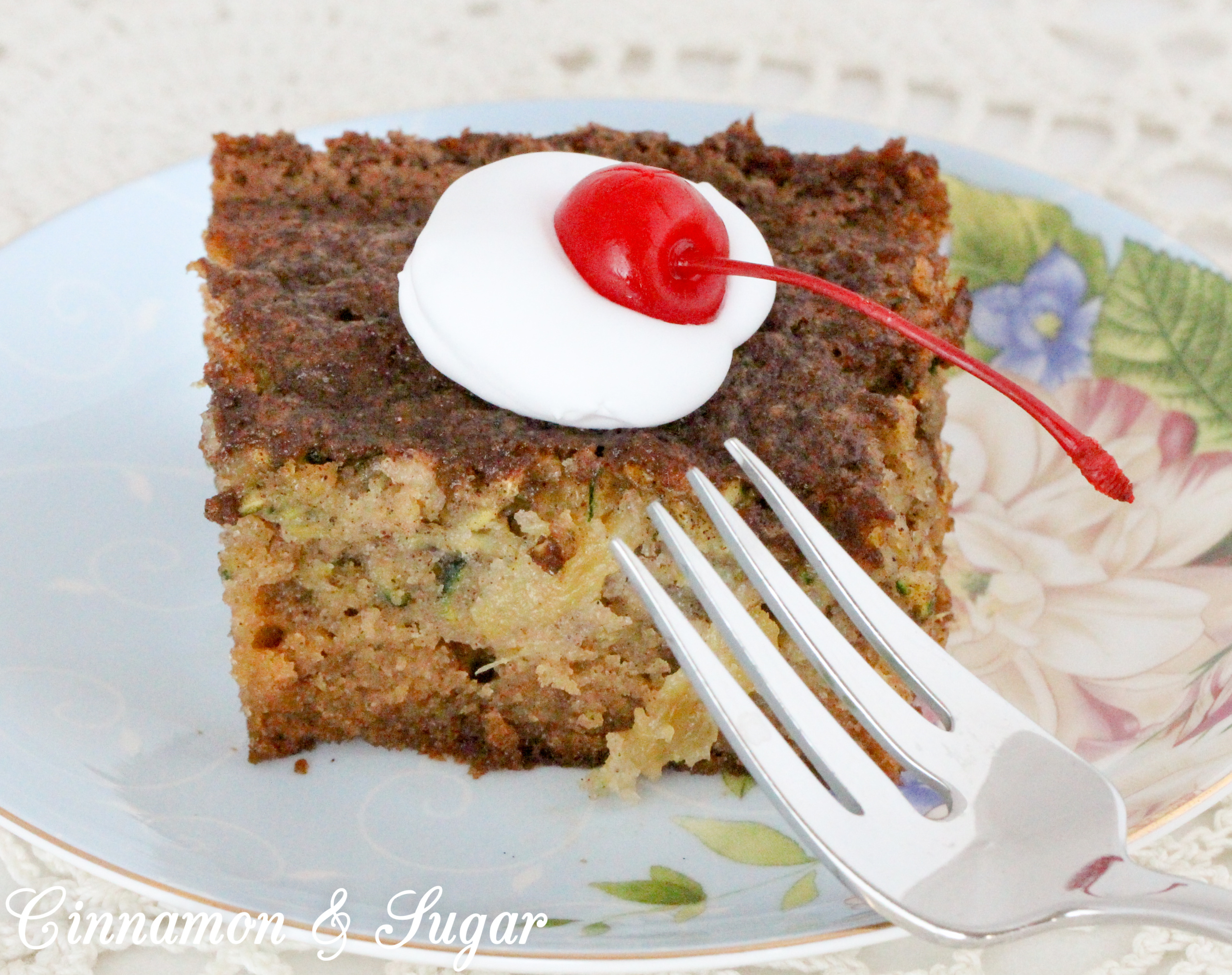 With a combination of both veggies and fruit, Zucchini Pineapple Cake is a supremely moist cake that's suitable for both dessert, snacks, or even breakfast. Recipe shared with permission granted by Krista Davis, author of THE DOG WHO KNEW TOO MUCH. 