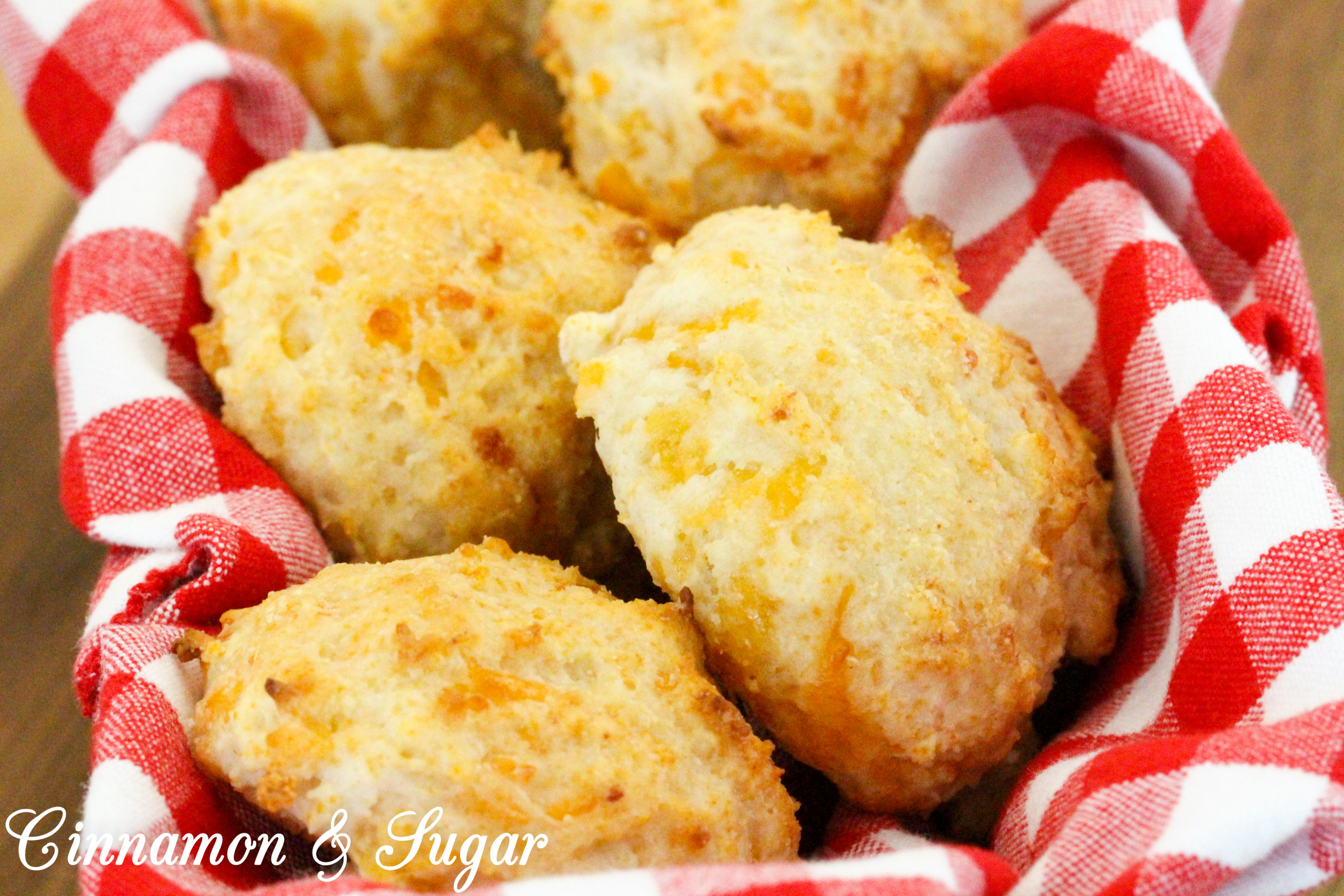 All that is required are a few simple ingredients, a few stirs in a bowl, a short bake and voilà, Garlic Cheese Biscuits provide a savory side that goes perfectly with soup or salaid. Recipe shared with permission granted by Nancy J. Cohen, author of EASTER HAIR HUNT.