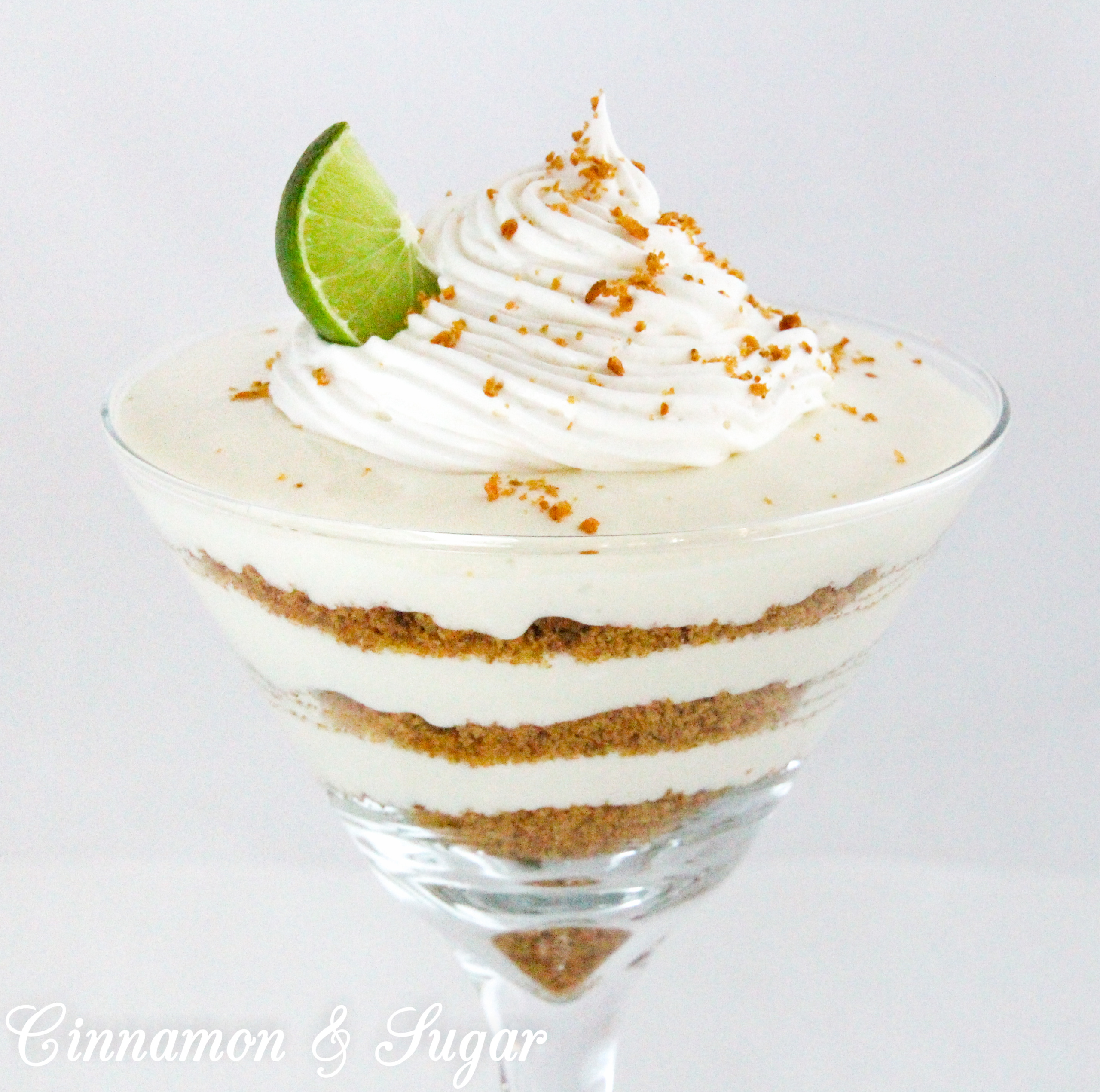 Key Lime Parfait combines tart citrus key limes with creamy whipped cream. Layered with crunchy, sweet graham cracker crumbs this dessert makes for an elegant presentation. Recipe shared with permission granted by Lucy Burdette, author of THE KEY LIME CRIME.