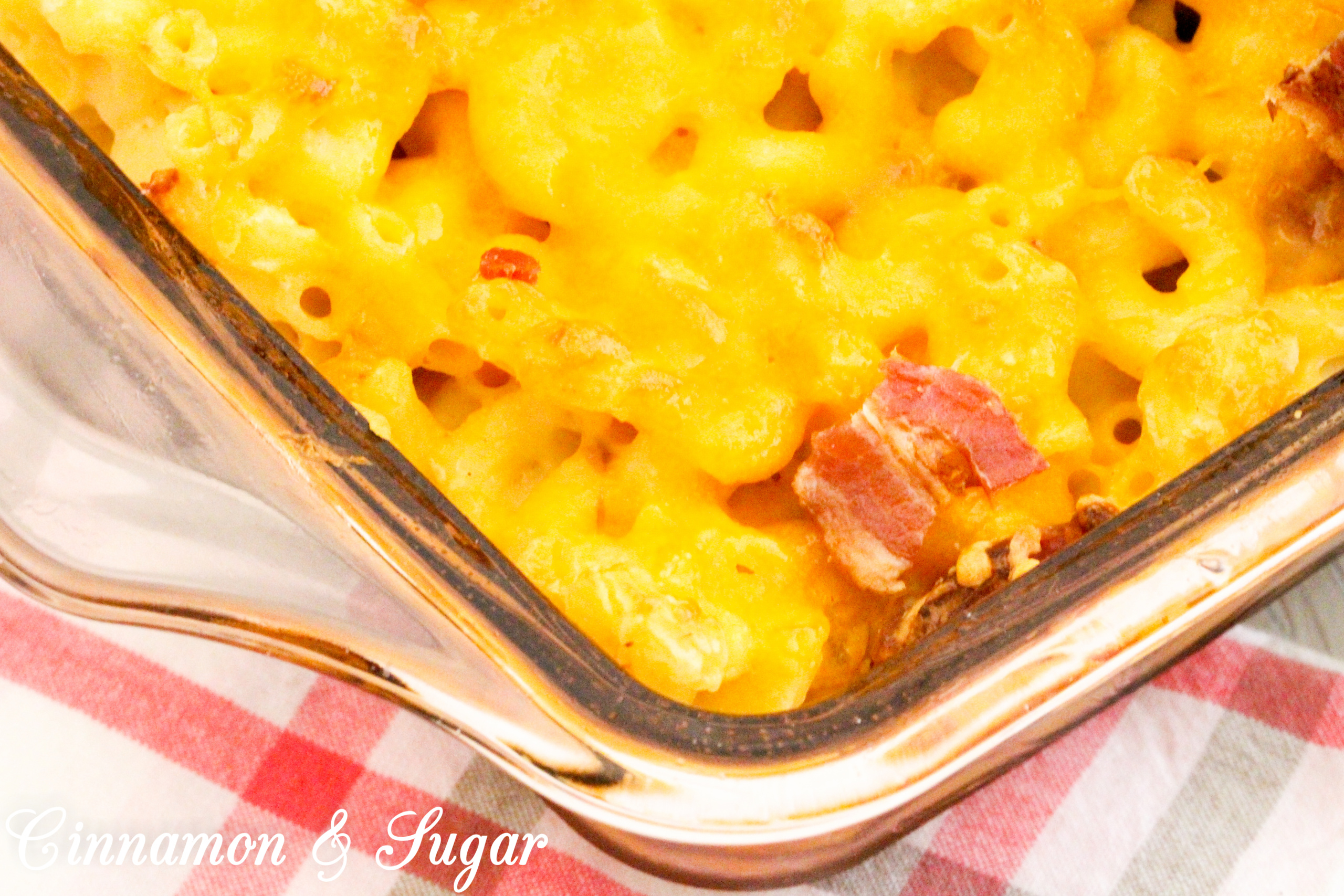 Missi's Mac and Cheese is rich, without the use of heavy cream and has plenty of flavor thanks to the addition of crisp, smoky bacon. Recipe shared with permission granted by Rosie A. Point, author of THE BURGER BAR MYSTERIES.