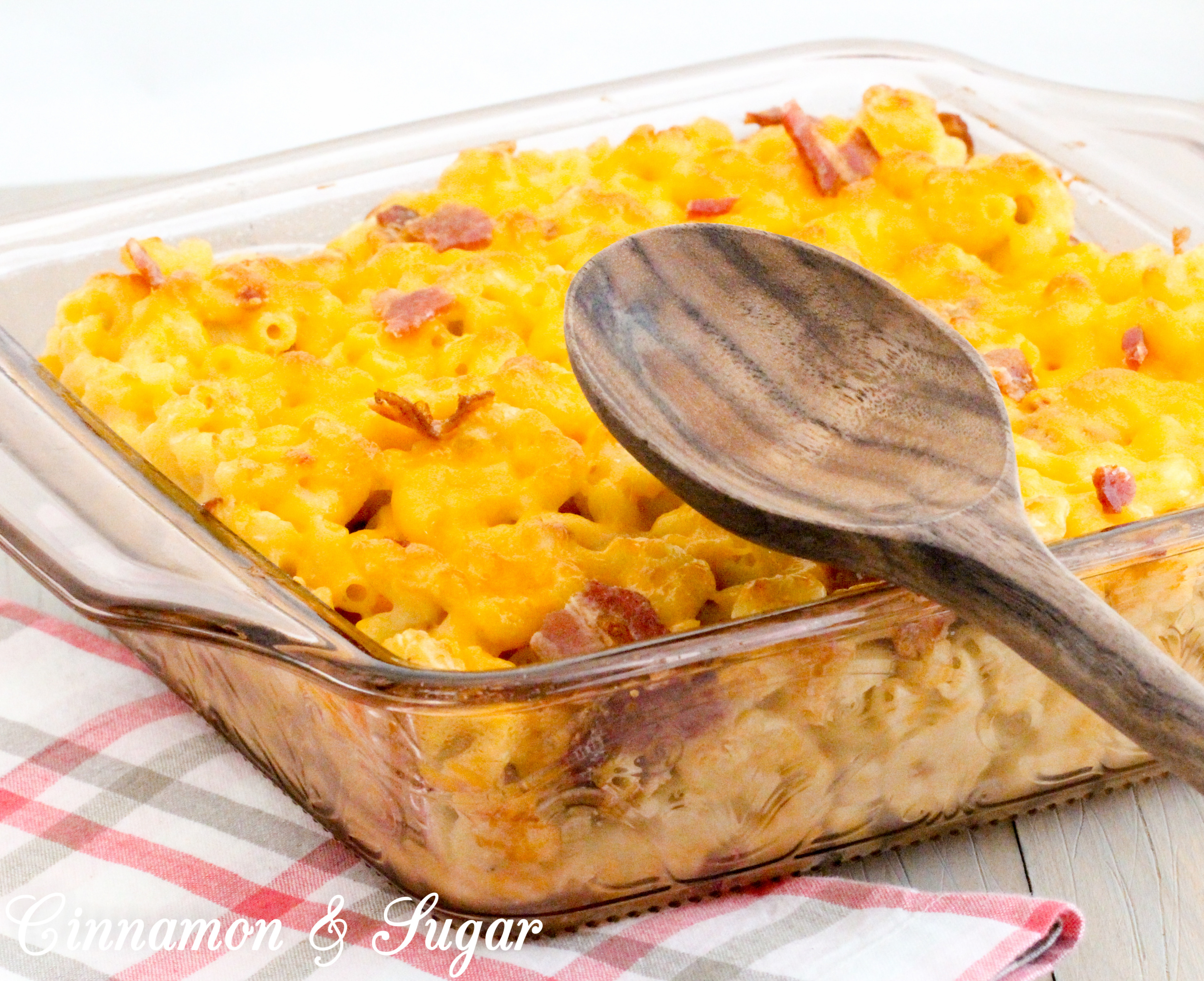 Missi's Mac and Cheese is rich, without the use of heavy cream and has plenty of flavor thanks to the addition of crisp, smoky bacon. Recipe shared with permission granted by Rosie A. Point, author of THE BURGER BAR MYSTERIES.