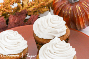 With warm spices of cinnamon, ginger, and nutmeg, Pumpkin Spice cupcakes are moist and could be eaten as a breakfast muffin. But piled high with Cinnamon Cream Cheese Frosting, these delectable treats are worthy of any celebration! Recipe shared with permission granted by Jenn McKinlay, author of PUMPKIN SPICE PERIL. 