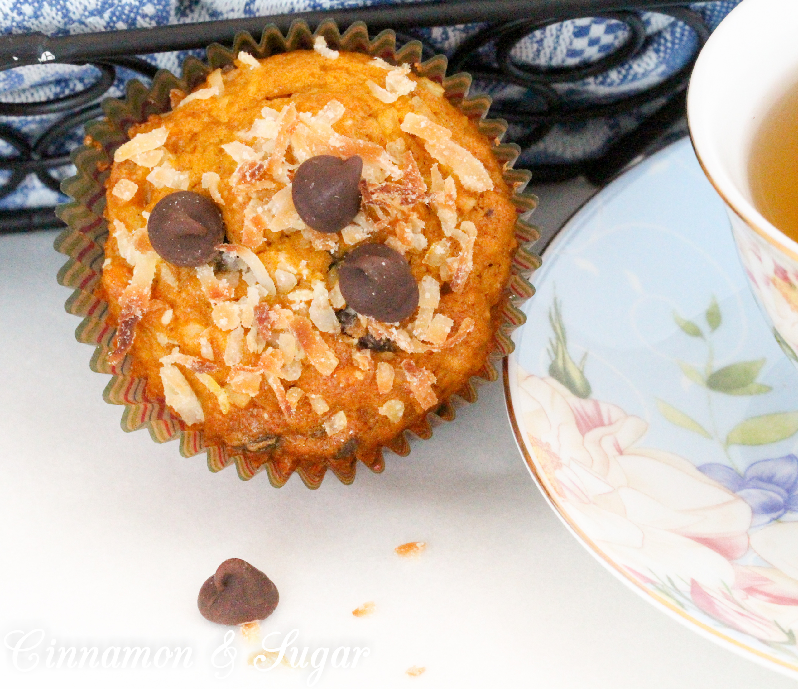 Pumpkin-Chocolate-Coconut Muffins uses pumpkin for moistness, chocolate for bittersweet sweetness and coconut for added sweet texture. Recipe shared with permission granted by Daryl Wood Gerber, author of SHREDDING THE EVIDENCE. 