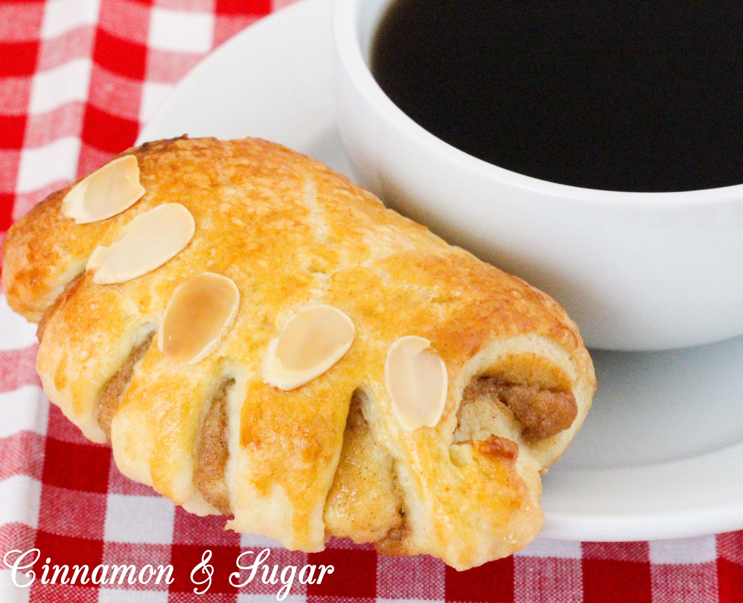 With flaky pastry encasing a sweet almond filling, these Almond Bear Claws are a scrumptious addition to breakfast, brunch, or coffee break! Recipe shared with permission granted by Elizabeth Logan, author of MOUSSE AND MURDER.