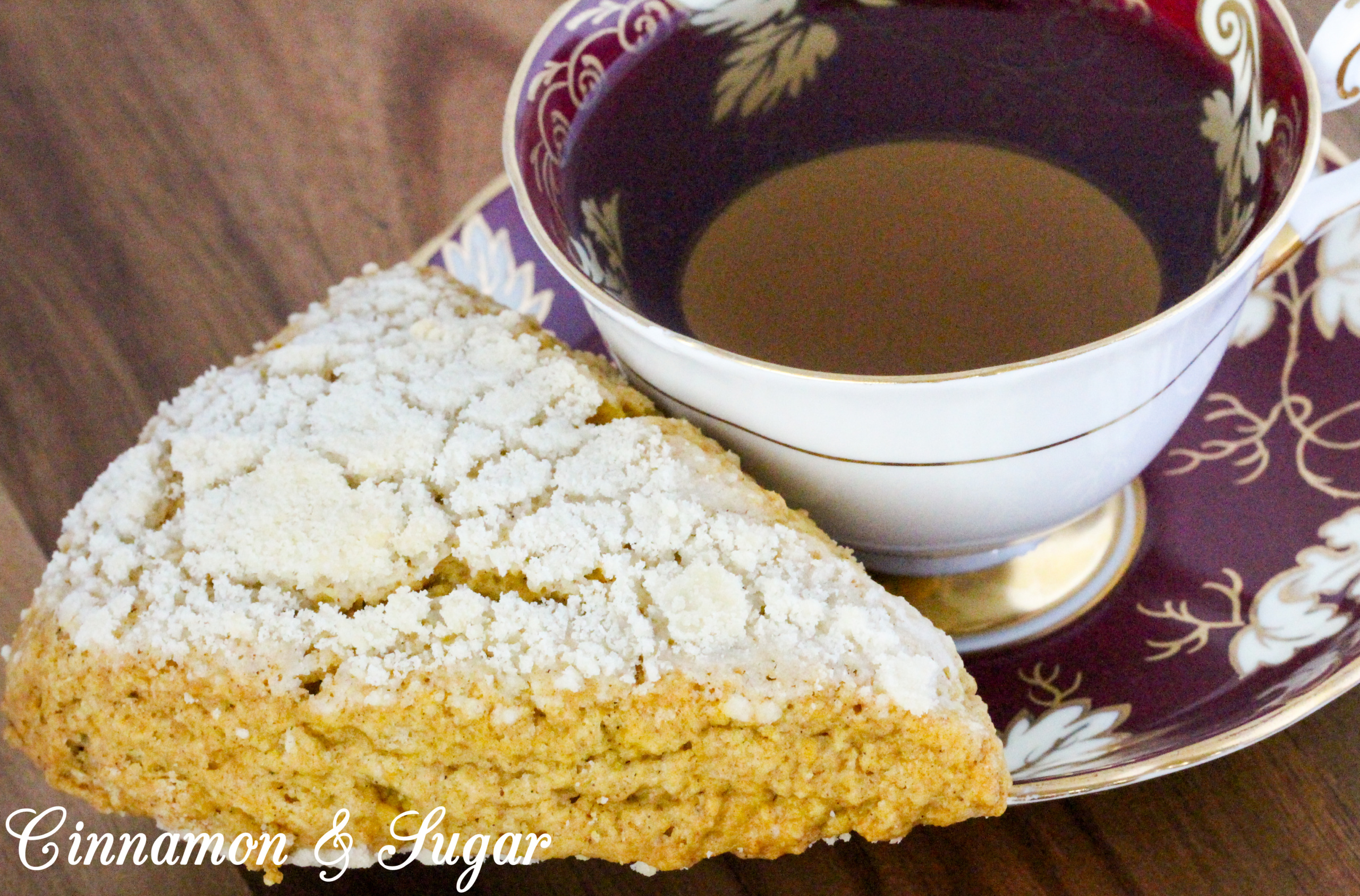 Sweet streusel complements the cinnamon in these Maple-Pumpkin Scones without being overly crumbly. Mild pumpkin brings color and a moist texture to these tea time treats. Recipe shared with permission granted by Kate Carlisle, author of THE GRIM READER. 