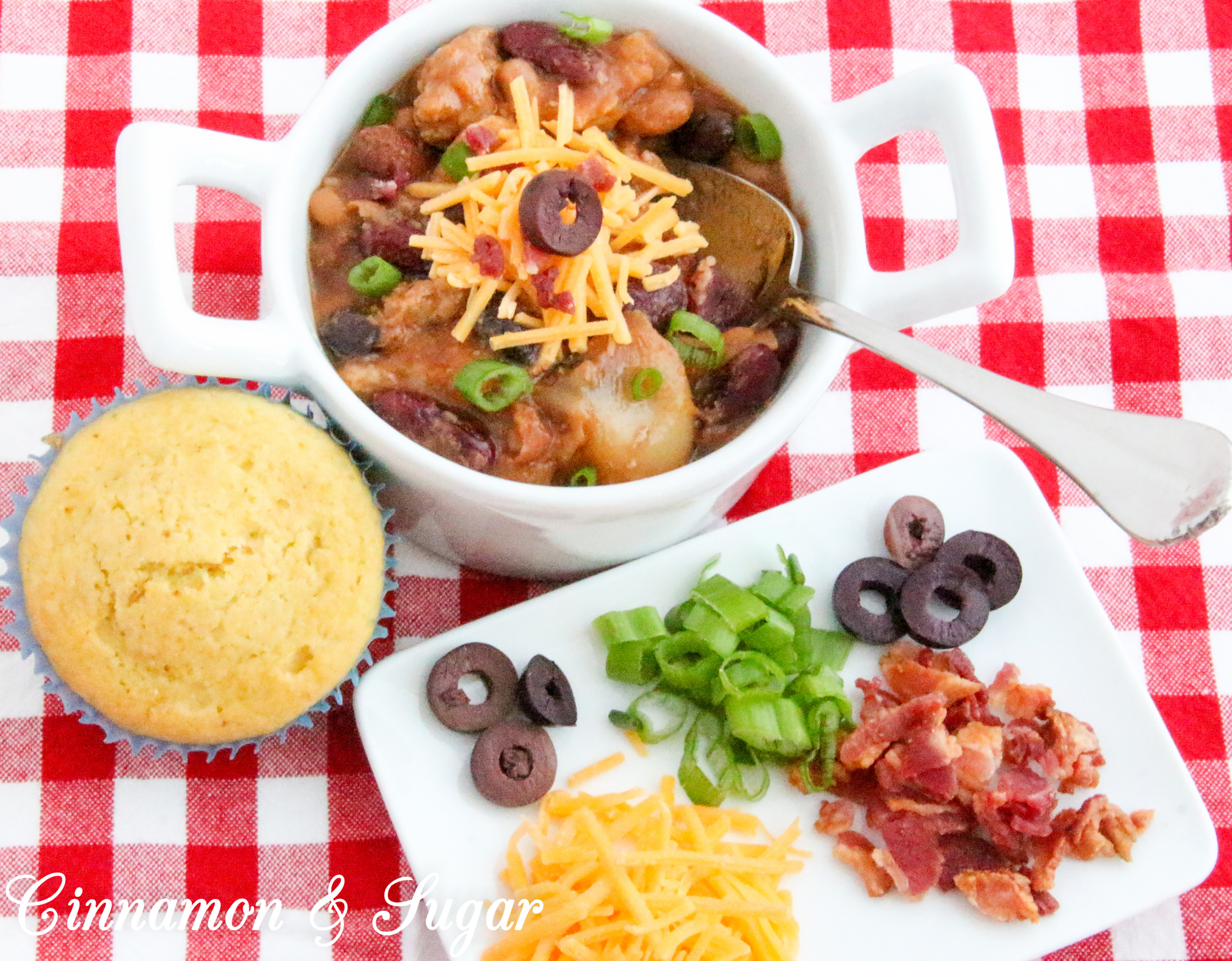 Using canned convenience products, the ease of making Potluck Beans belies the savory deliciousness of this dish, whether served as a side dish or an entrée. Recipe from cozy mystery Sprinkles of Suspicion by Kim Davis.