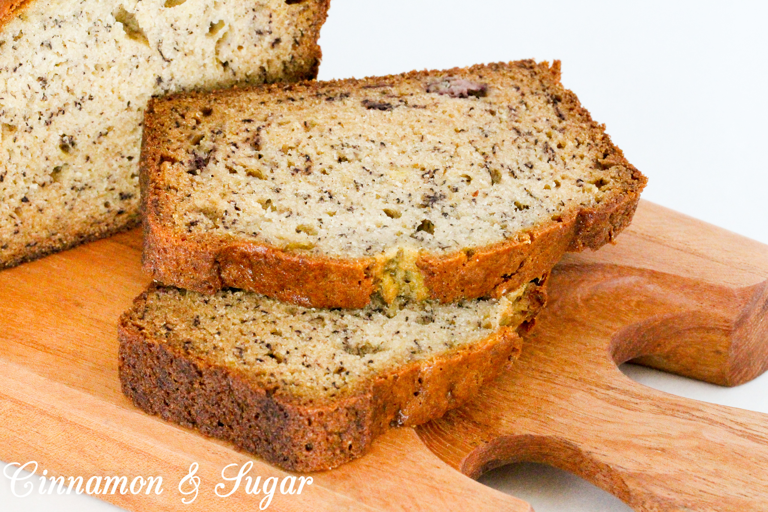 Hilda's No-Fail Banana Bread is quick and easy to mix up since a fork and bowls are the only equipment required. It doesn't take long for a sweet aroma to fill the air as the bread bakes and sliced warm with a pat of butter, this treat will hit the spot! Recipe shared with permission granted by Mary Lee Ashford, author of THE QUICHE OF DEATH.