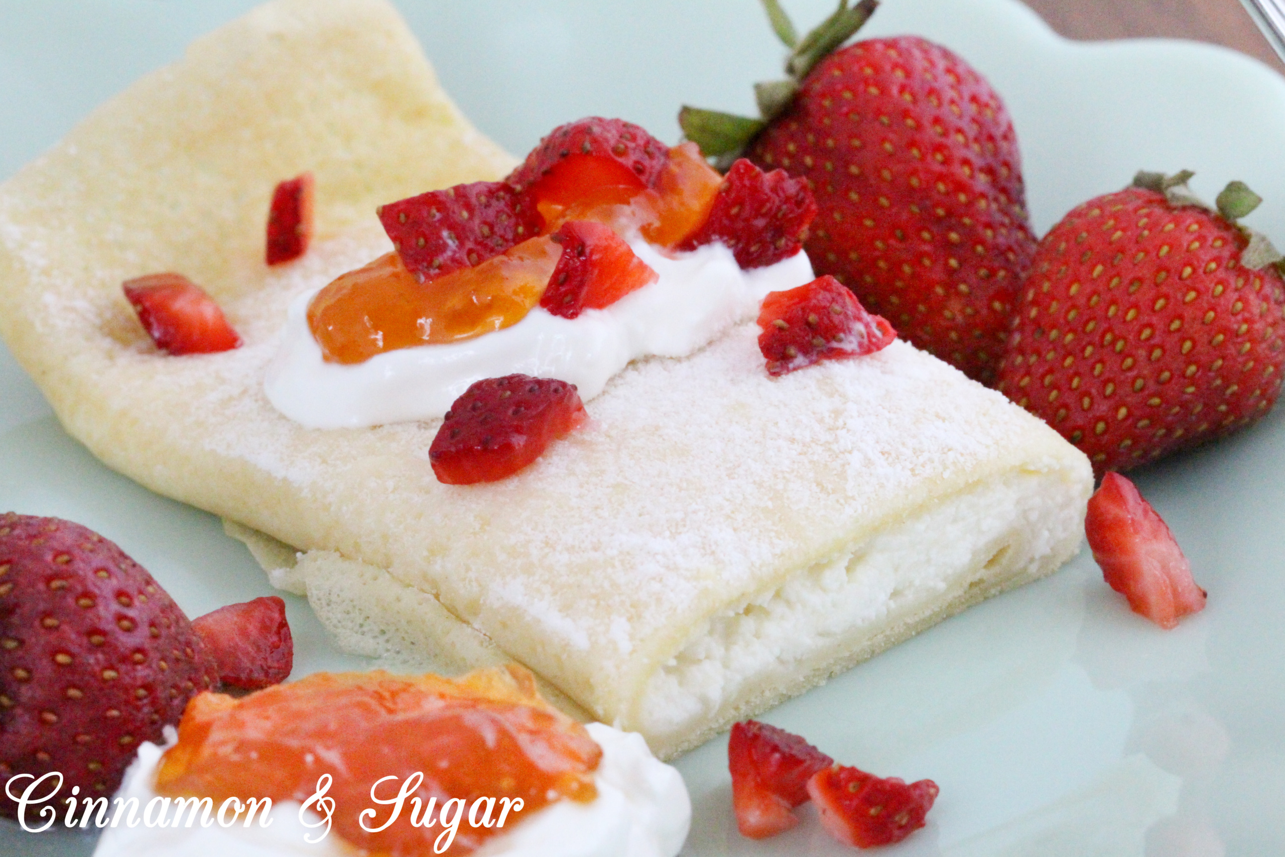 A traditional Hungarian dish, Juliana’s Palacsinta are sweet cheese-filled crepes and baked with a light sprinkle of powdered sugar after filling. Garnish with sour cream, fresh strawberries, and jam for a delicious brunch or a breakfast-themed dinner. Recipe shared with permission granted by Julia Buckley, author of DEATH OF A WANDERING WOLF. 