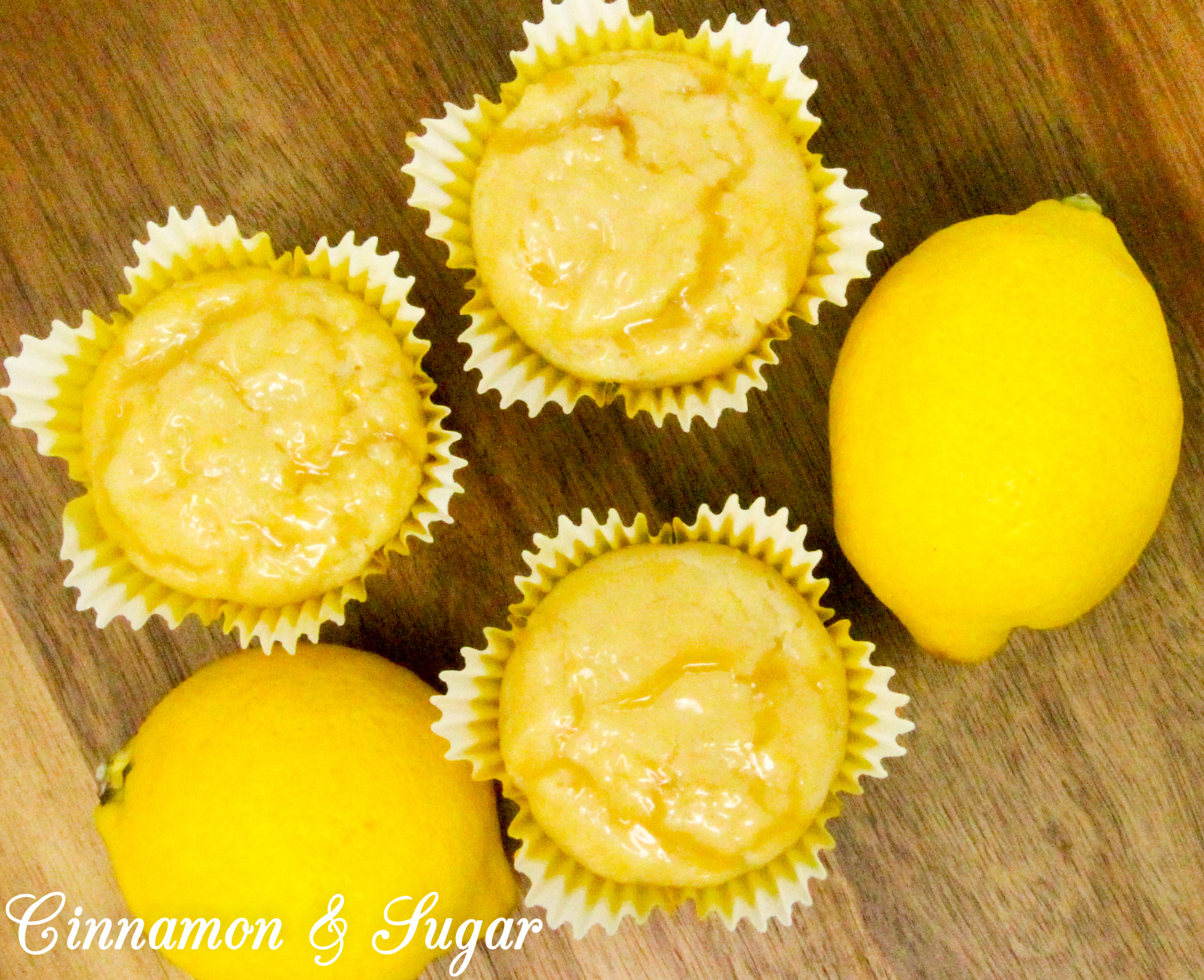 Lemon Curd Muffins are super moist and ultra flavorful thanks to the generous amounts of lemon zest, lemon juice, and lemon curd! A delicious treat for breakfast and snack time, or serve with a dollop of ice cream for dessert. Recipe shared with permission granted by Libby Klein, author of WINE TASTINGS ARE MURDER.