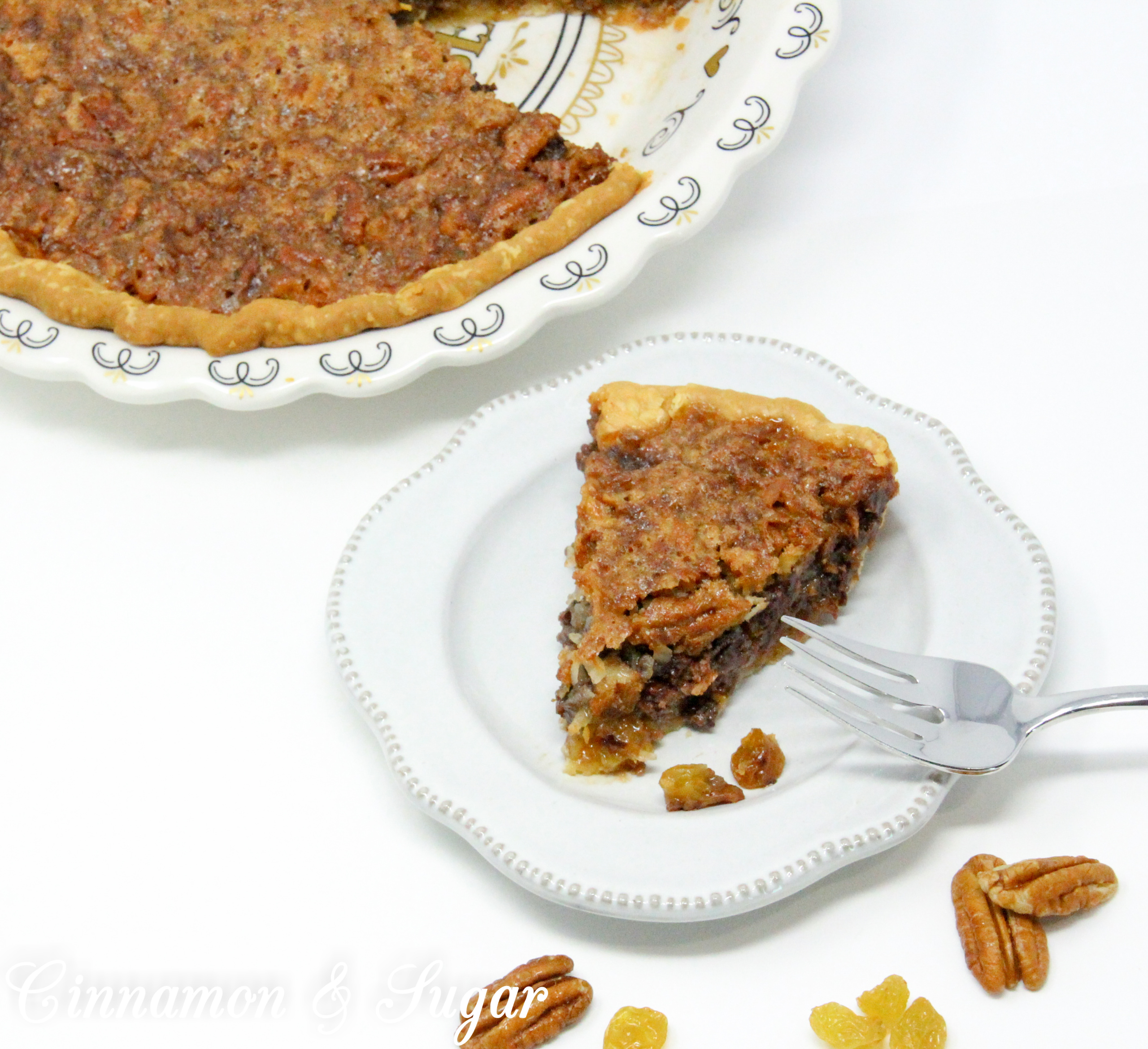 With a base similar to pecan pie, the addition of chocolate, raisins, and coconut raises the scrumptious level of Sugar High Pie to the stratosphere! Recipe shared with permission granted by Ellen Byron, author of MURDER IN THE BAYOU BONEYARD.