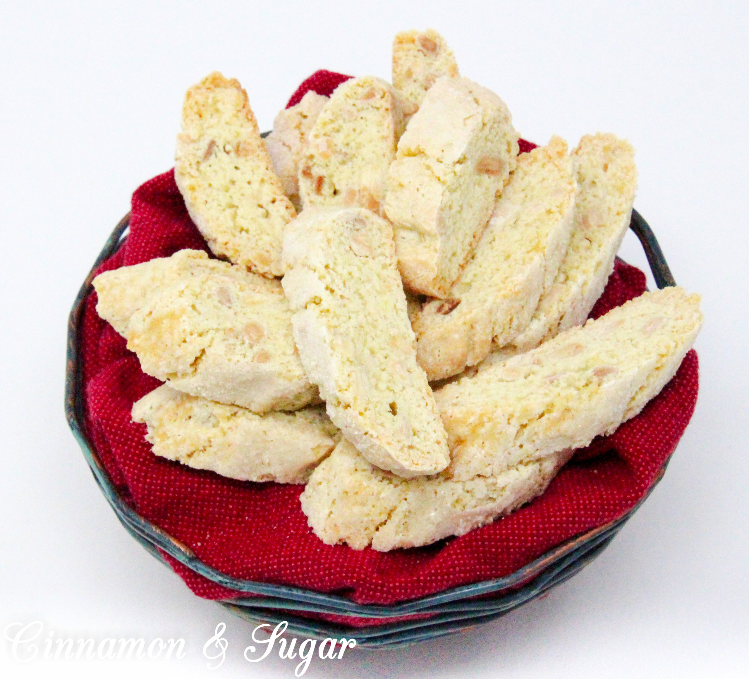 Crunchy, with a delicate almond flavor thanks to a generous amount of toasted almonds, these traditional Almond Biscotti don't contain any butter or oil. Perfect for dunking in your favorite hot beverage! Recipe shared with permission granted by Leslie Budewitz, author of THE SOLACE OF BAY LEAVES.