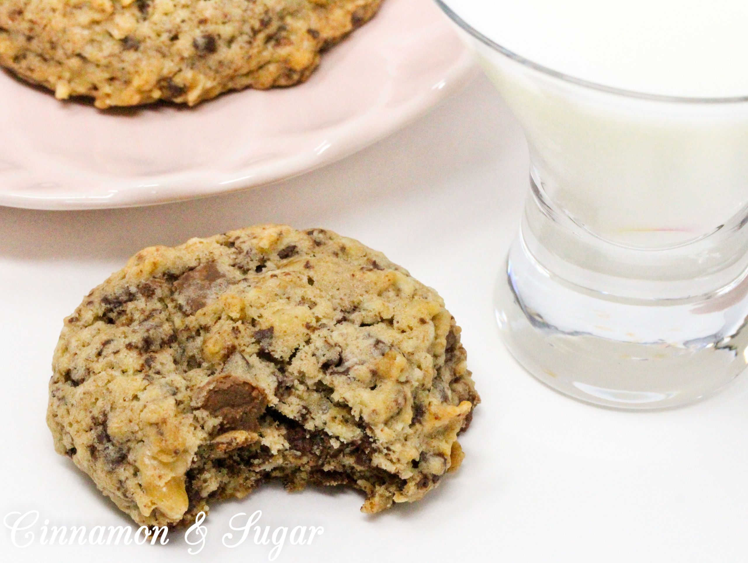 Hearty Double Chocolate Oatmeal Cookies are loaded with chocolate galore along with a substantial amount of oatmeal and walnuts. This recipe makes a HUGE batch of cookies, perfect to share with family, friends, and neighbors! Recipe shared with permission granted by Debra Sennefelder, author of THE CORPSE WHO KNEW TOO MUCH. 