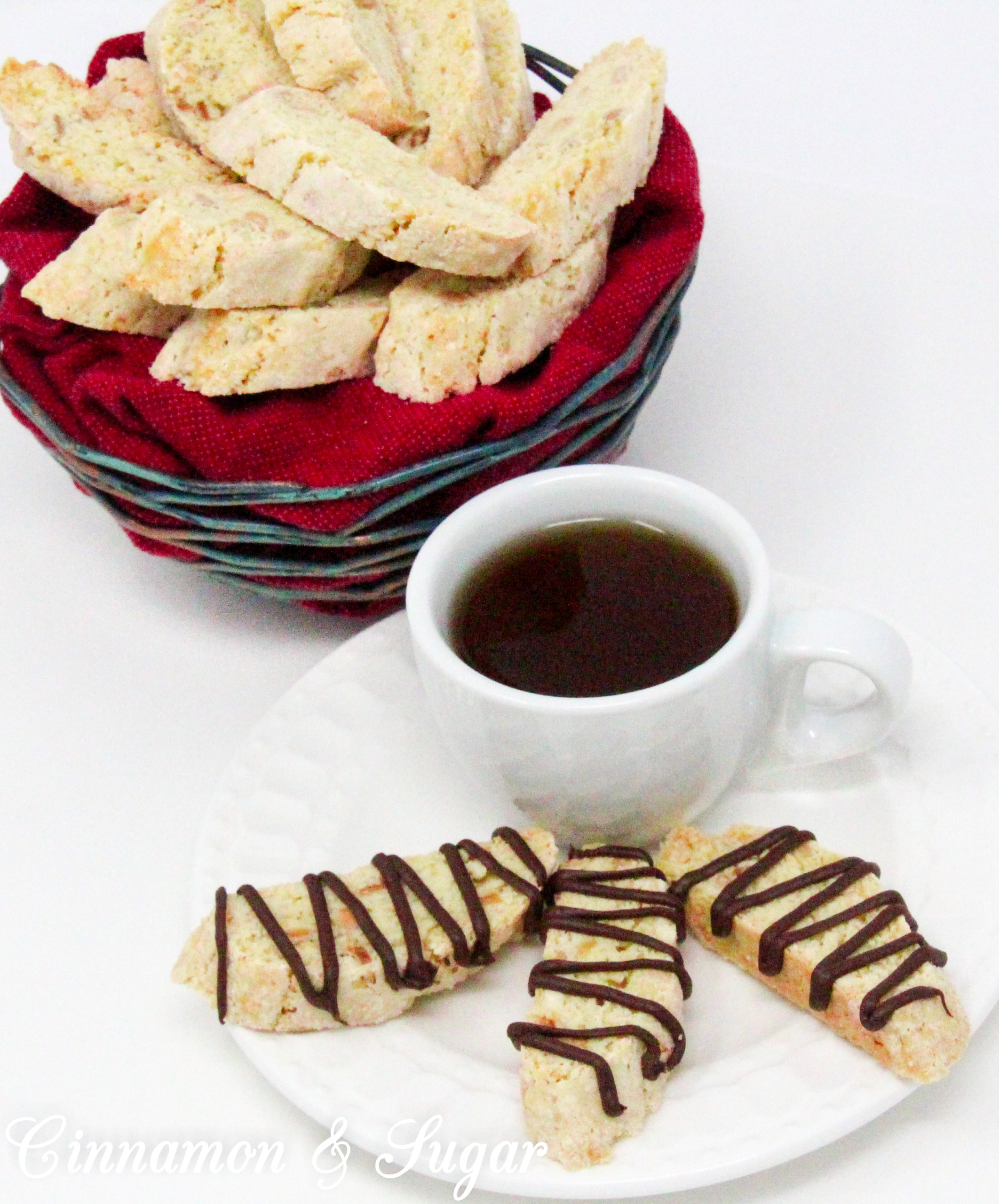 Crunchy, with a delicate almond flavor thanks to a generous amount of toasted almonds, these traditional Almond Biscotti don't contain any butter or oil. Perfect for dunking in your favorite hot beverage! Recipe shared with permission granted by Leslie Budewitz, author of THE SOLACE OF BAY LEAVES.