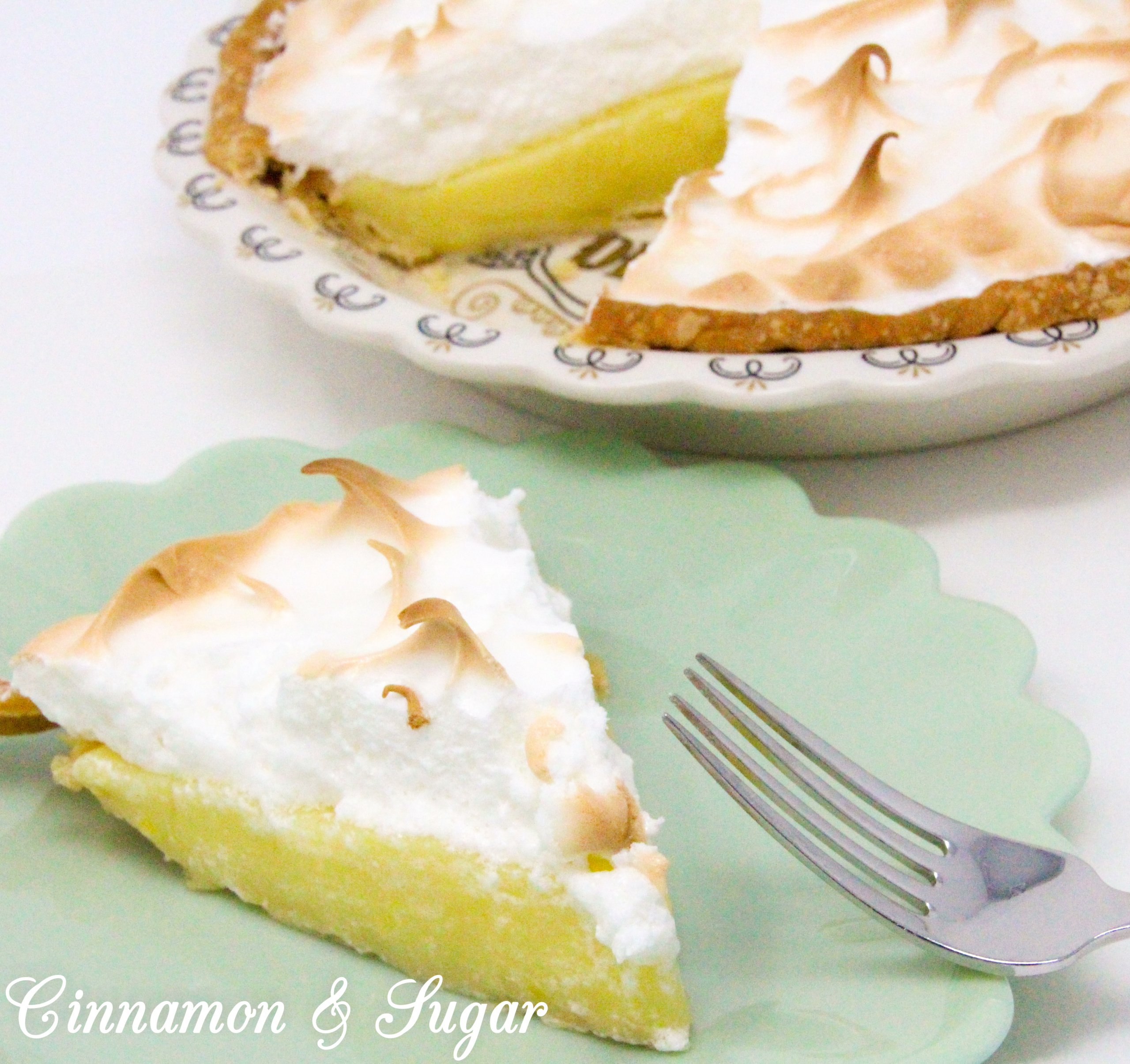 Lemony sweet-tart custard filling piled high with billowing cloud-like meringue, Susan Cutie's Lemon Meringue Pie is a refreshing dessert! Recipe shared with permission granted by Tina Kashian, author of MISTLETOE, MOUSSAKA, AND MURDER.