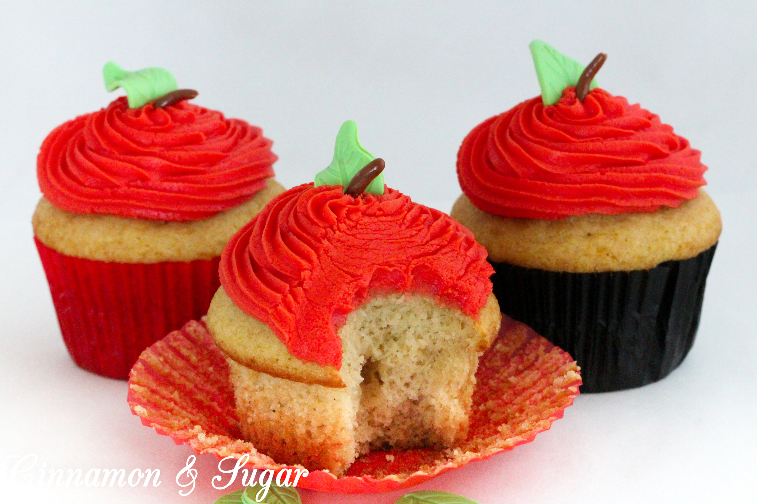 Poison Apple Cocktail Cupcakes, with generous amounts of boozy libations in both the batter and the frosting, are a fun and tasty addition to grownup Halloween celebrations. Recipe created by Kim Davis, author of CAKE POPPED OFF. 