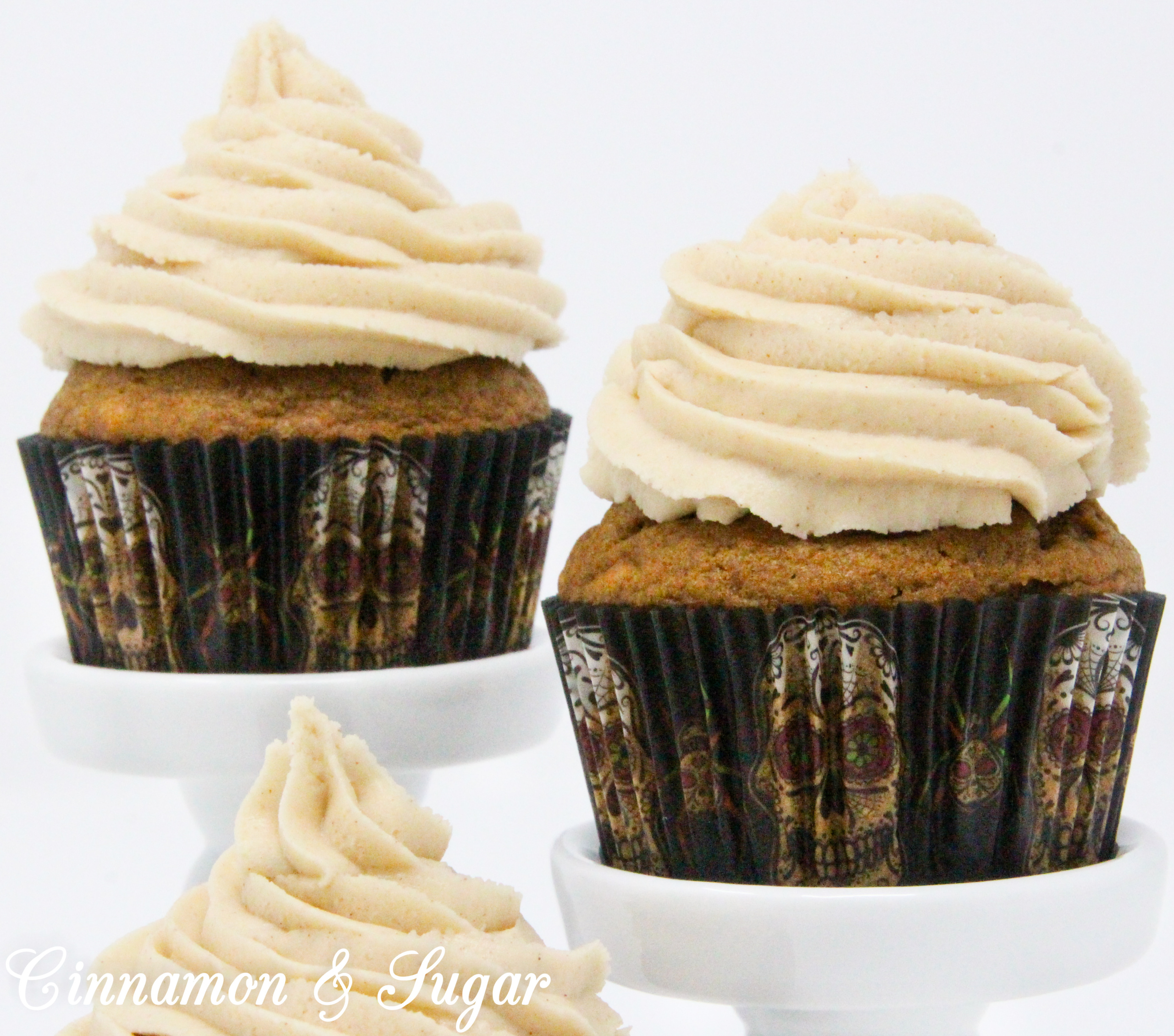 Fireball Pumpkin Spiced Coffee Cupcakes combine the flavors of fall with the bite of warming cinnamon whiskey. These cocktail cupcakes are perfect for imbibing in front of a cozy fire or sharing with friends as you celebrate autumn. Recipe created by Kim Davis, author of CAKE POPPED OFF.