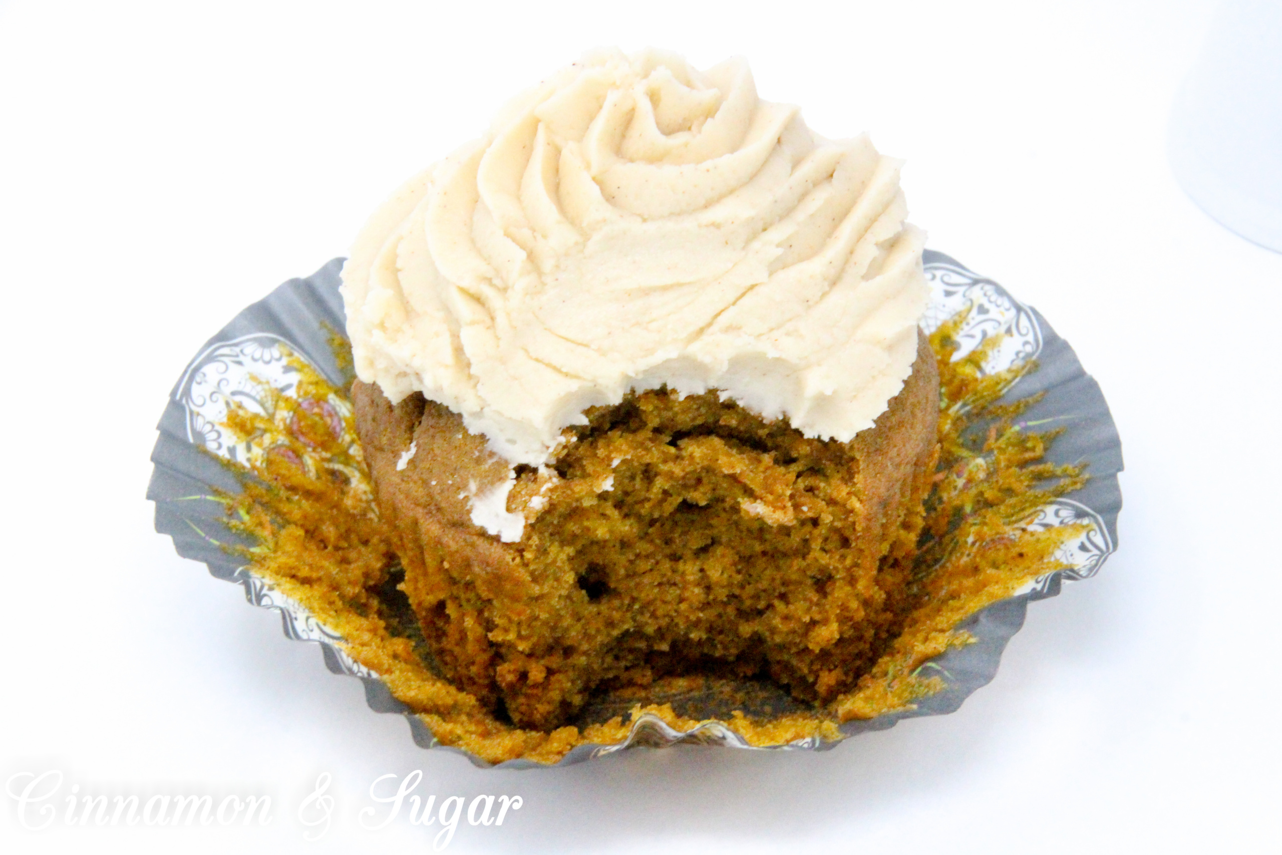 Fireball Pumpkin Spice Coffee Cupcakes combine the flavors of fall with the bite of warming cinnamon whiskey. These cocktail cupcakes are perfect for imbibing in front of a cozy fire or sharing with friends as you celebrate autumn. Recipe created by Kim Davis, author of CAKE POPPED OFF.