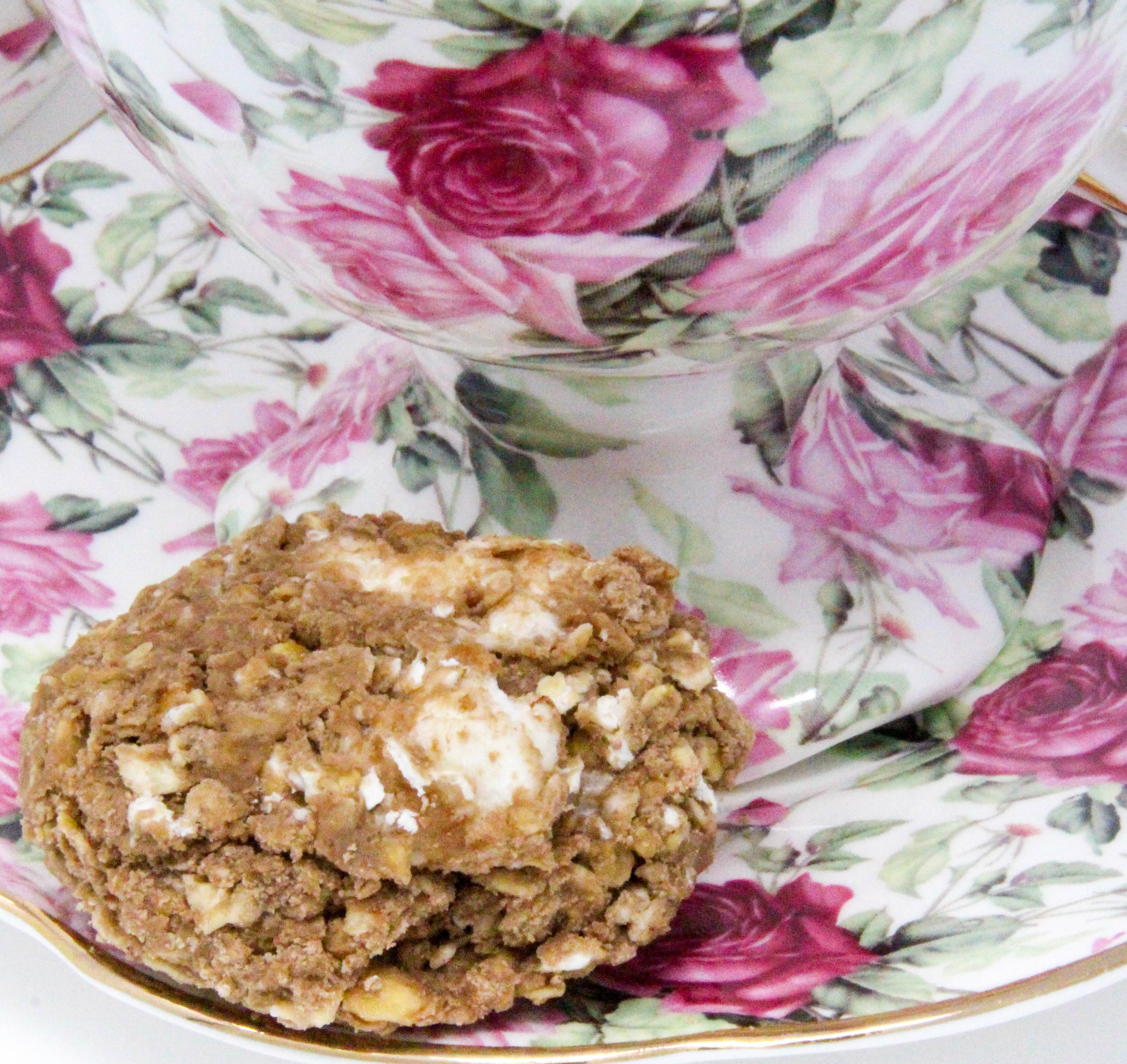 Quick Cookies combines the favorite flavors of chocolate and peanut butter in an easy-to-make, no-bake cookie. Sweet marshmallows and a drizzle of melted chocolate make these a great afternoon treat. This family recipe is shared with permission granted by Lynn Cahoon, author of KILLER COMFORT FOOD.